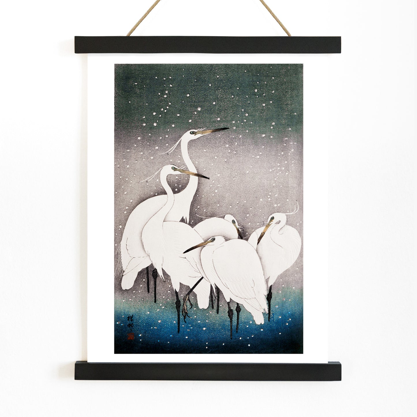 Group of egrets standing together in the snow artwork by Ohara Koson poster, with wooden magnetic frame on white background