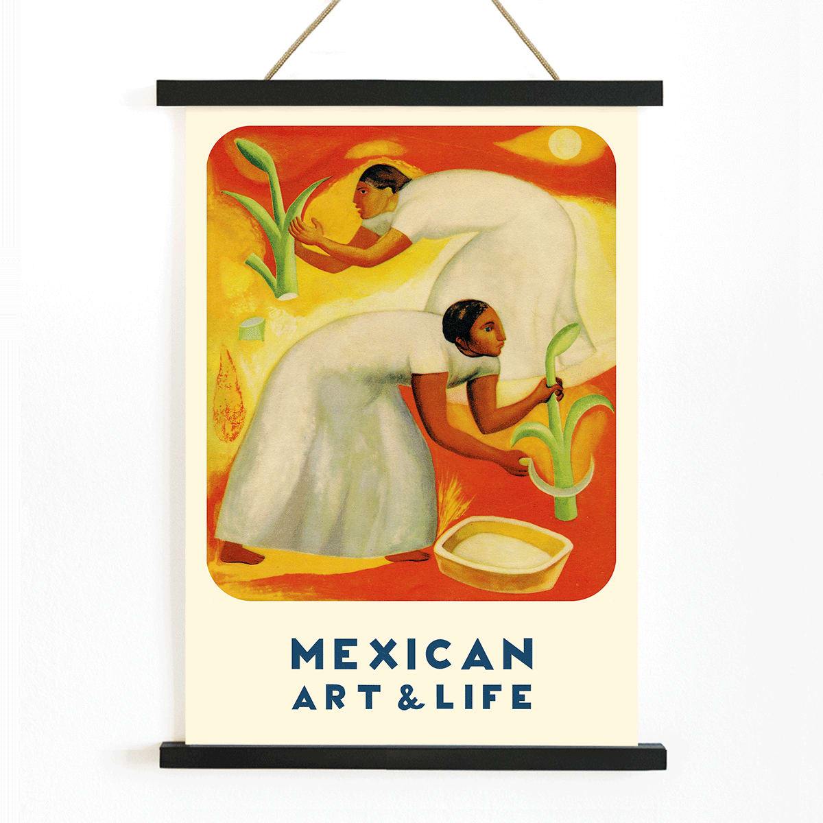 Diego Rivera painting of two women in white dresses harvesting crops in a vibrant orange and yellow field Mexican Art and Life magazine cover poster, with wooden magnetic frame on white background