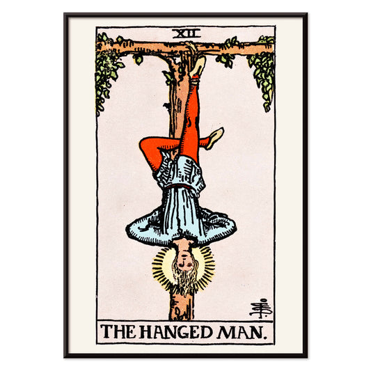 Hanged Man Tarot Card by Rider Waite, figure hanging upside down from wooden structure, mystical poster art, with black aluminium frame on white background