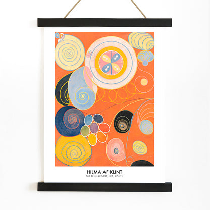 Abstract colorful spirals and organic shapes on vibrant orange background from The Ten Largest Youth by Hilma af Klint, with wooden magnetic frame on white background