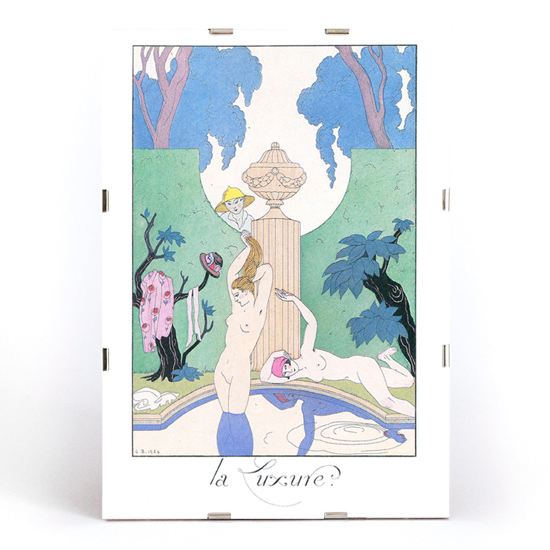 Art Deco poster La Luxure by George Barbier featuring elegant nude women lounging by a fountain in a decorative garden scene, framed and displayed in modern living room decor
