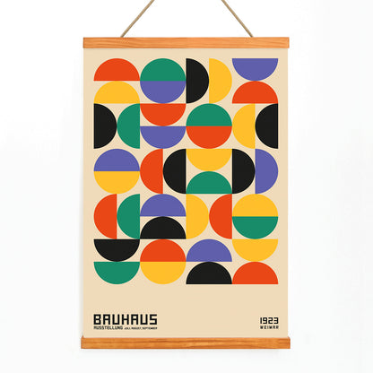 Bauhaus Poster 11 with colorful geometric shapes in a grid pattern inspired by the Weimar Exhibition artwork, with wooden magnetic frame on white background