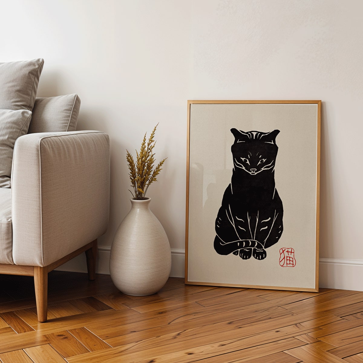 Black Cat artwork by unknown artist and Anonymous featuring a stylized minimalist black cat on beige background with red stamp detail, framed and displayed in home decor