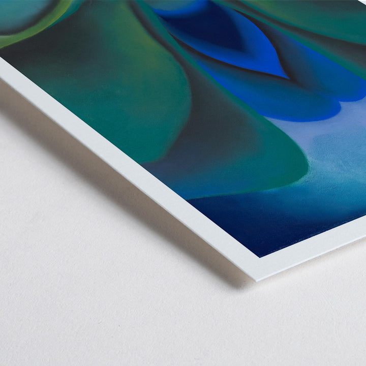 Closeup detail of Georgia OKeeffe Blue Flower poster luminous blue and green abstract bloom with soft yellow center
