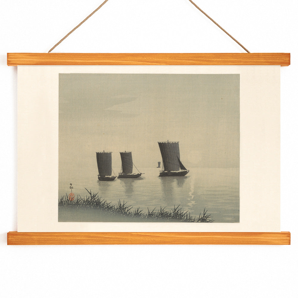 Serene Japanese art of three traditional fishing boats on calm water at sunset by Ohara Koson, with wooden magnetic frame on white background