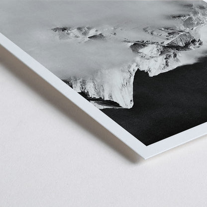 Closeup detail of Broad Peak mountain view from Godwin-Austen Glacier snow-covered and obscured by clouds photo by Vittorio Sella