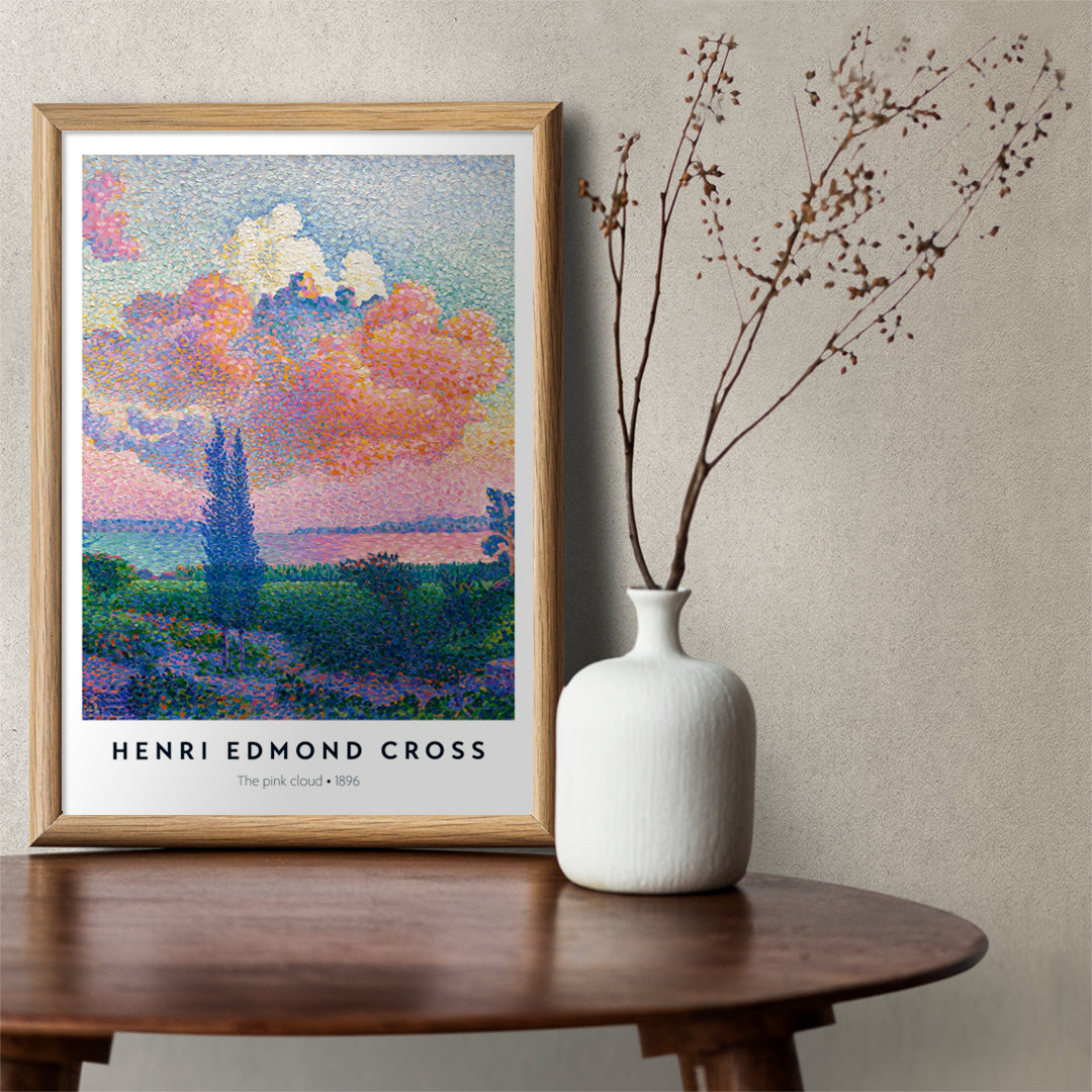Colorful landscape poster with a vivid pink cloud by Henri Edmond Cross titled The Pink Cloud, framed and displayed in home decor