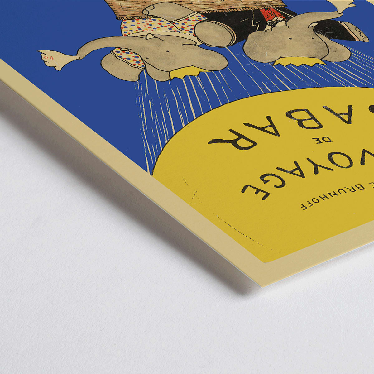 Closeup detail of Le Voyage de Babar by Jean de Brunhoff illustration and poster featuring elephants in a hot air balloon with a yellow balloon on a blue background