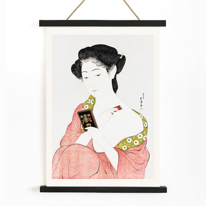 High resolution Japanese art print of a woman in a kimono applying powder by Goyo Hashiguchi titled Woman Applying Powder, with wooden magnetic frame on white background