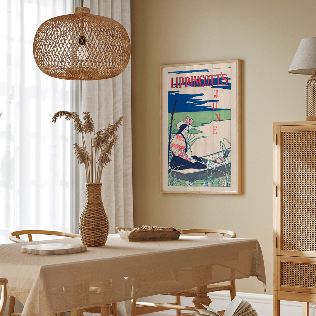 Woman boating on a serene river wearing a striped dress and hat surrounded by reeds and water lilies Lippincotts June by William Carqueville, framed and displayed in home decor