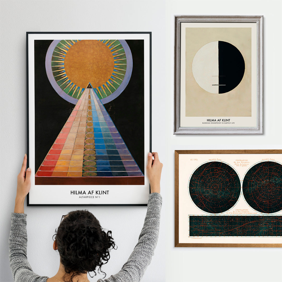 Colorful geometric abstract art poster with radiant circle pyramid and sun motif by Hilma AF Klint Altarpiece No 1 Group X, with wooden magnetic frame on white background