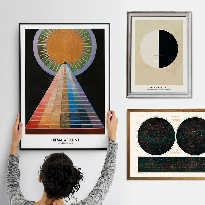 Colorful geometric abstract art poster with radiant circle pyramid and sun motif by Hilma AF Klint Altarpiece No 1 Group X, with wooden magnetic frame on white background