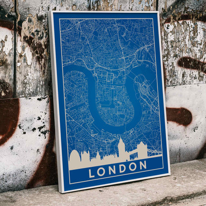 Minimalist London map artwork poster with blue background white map details by artist Anonymous featuring major landmarks, framed and displayed in home decor