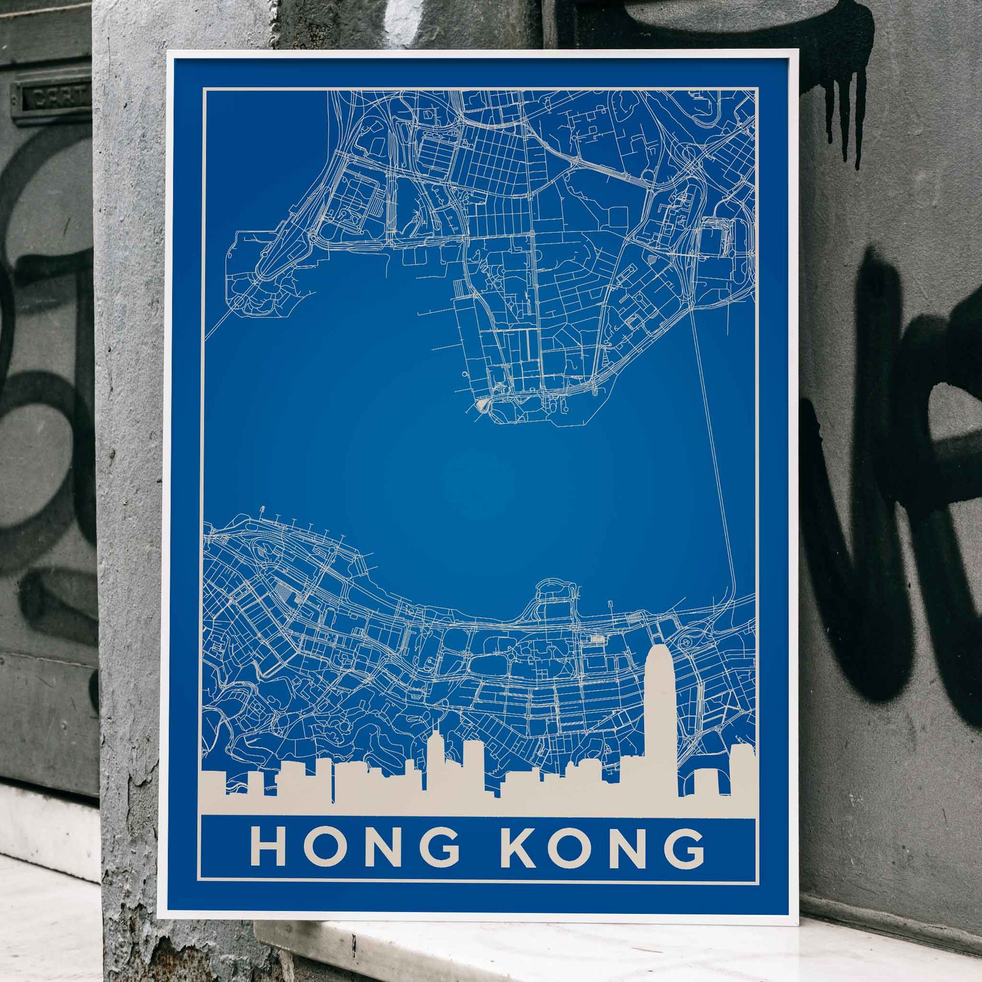 Minimalist Valencia Map poster by artist Minimalist featuring a detailed blue and white city map and skyline, framed and displayed in home decor