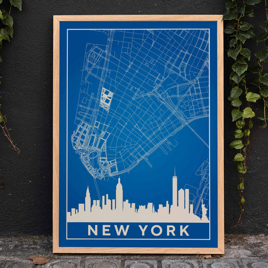 New York Minimalist Map poster by artist New York featuring a blue and white outline of New York City streets above a city skyline silhouette, framed and displayed in home decor