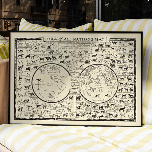Dogs of All Nations Map by Frantz E illustrated poster featuring various dog breeds from around the world, framed and displayed in home decor