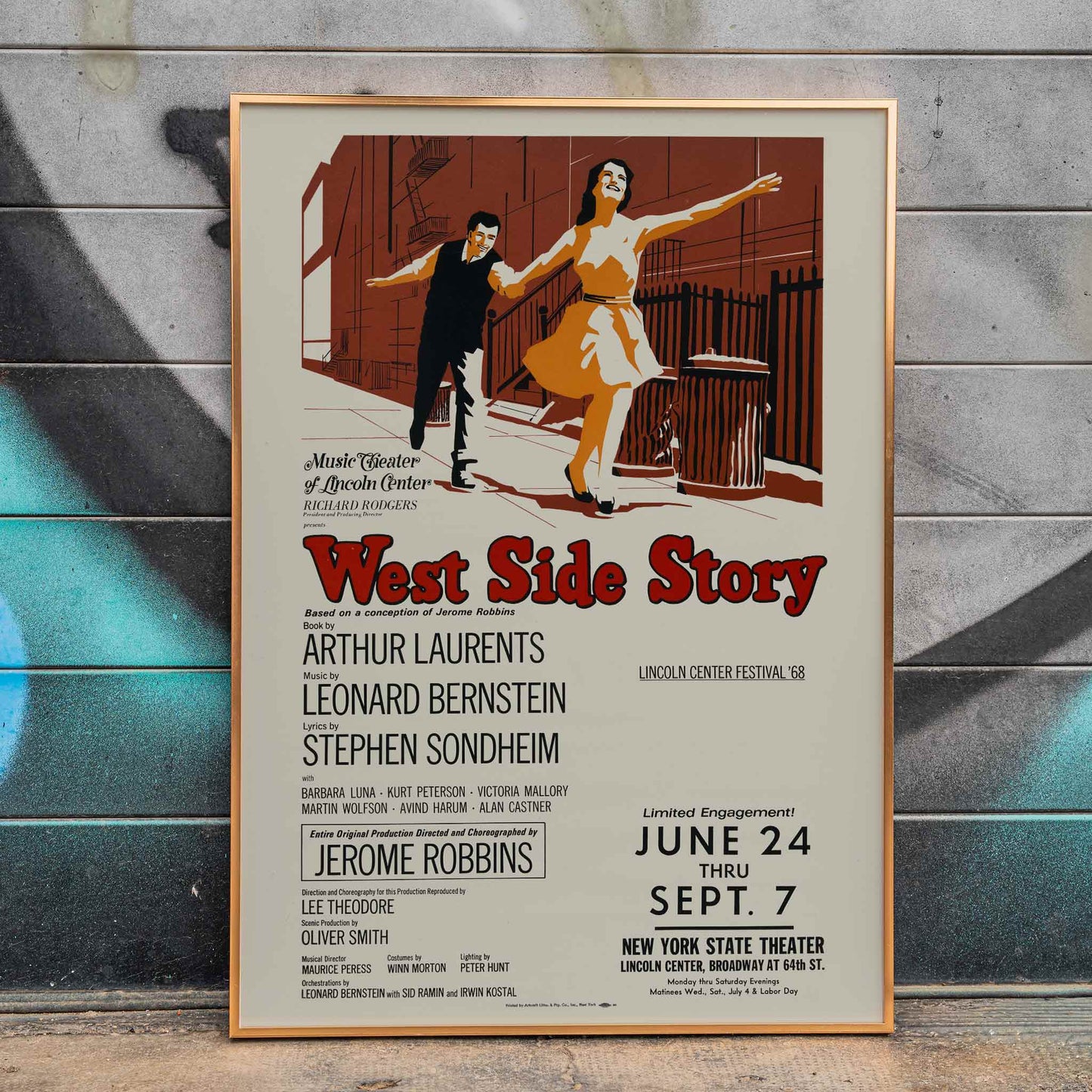 West Side Story Artcraft Lithograph promotional poster featuring a dancing couple and performance details, framed and displayed in home decor