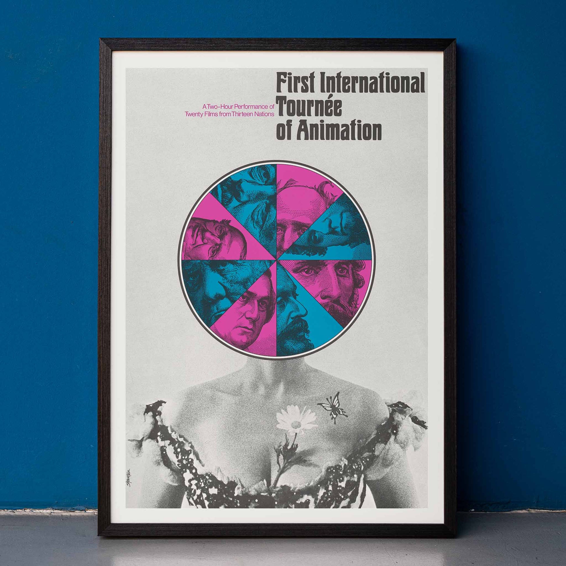 Poster for First International Tournee of Animation by Paul Showalter with abstract faces colorful geometric graphic and grayscale torso, framed and displayed in home decor