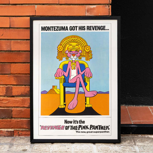 Pink Panther Montezuma themed artwork and poster titled Revenge of the Pink Panther featuring the Pink Panther sitting on a throne, framed and displayed in home decor