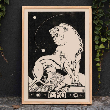 Art deco poster of a stylized roaring lion representing Leo zodiac sign by Henri van der Stok in black and white, framed and displayed in home decor
