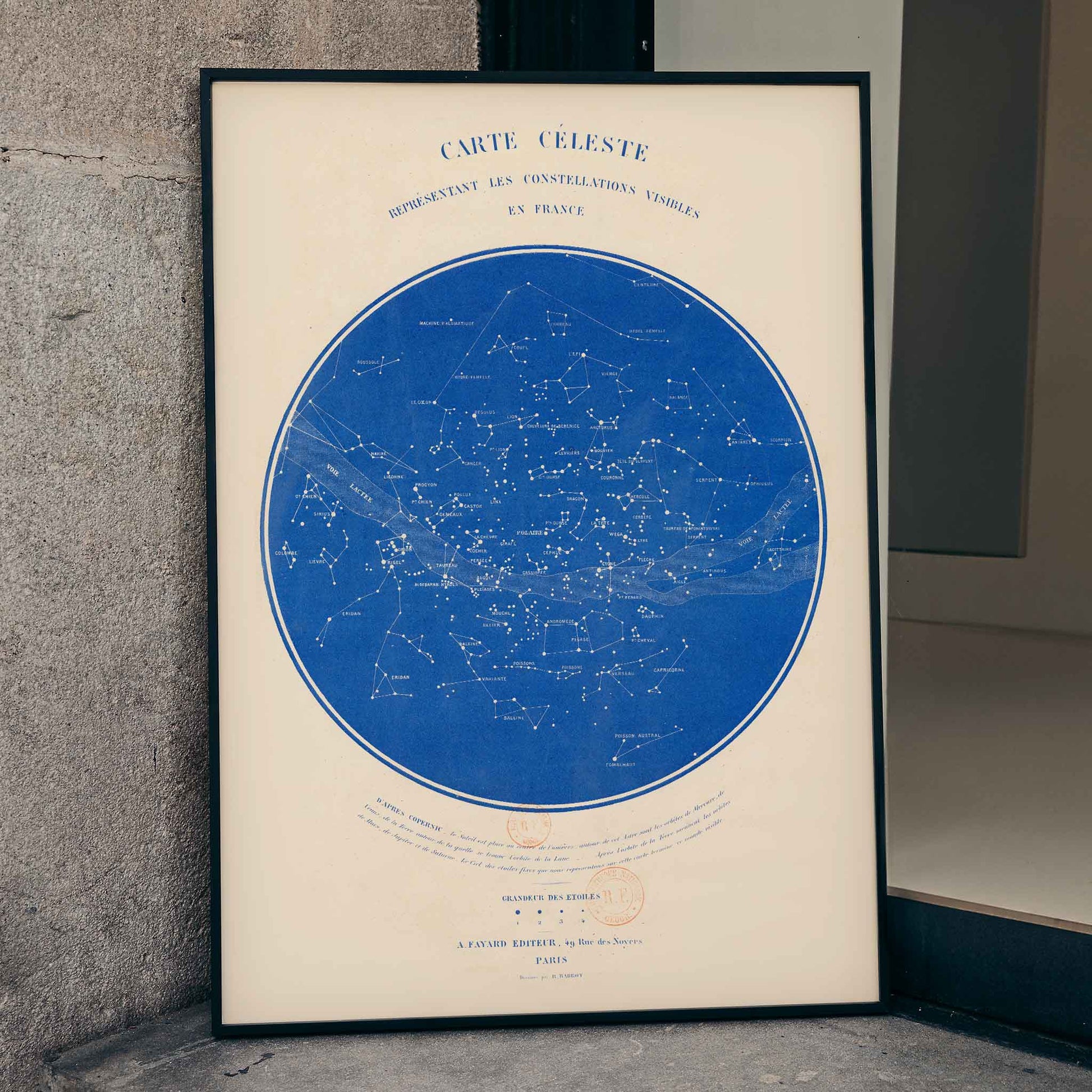 Carte celeste star map of constellations visible in France by R Barbot detailed blue background poster, framed and displayed in home decor