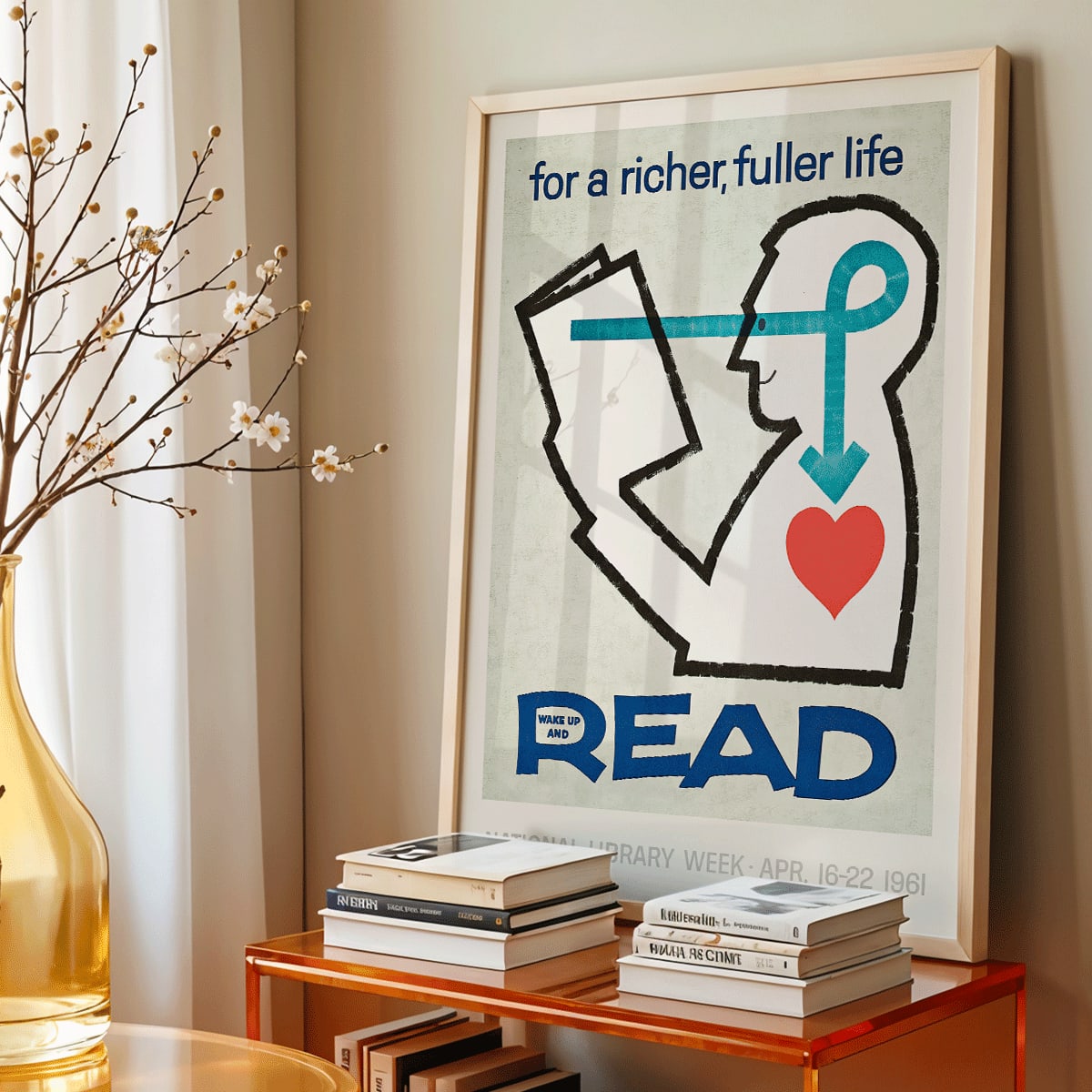 Poster with a stylized person reading a book and heart with bold text for a richer fuller life wake up and read by National Library, framed and displayed in home decor